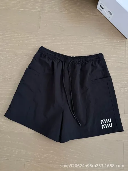 Miu Miu Logo-Embroidered Drawstring Shorts Beige and Black - 4
