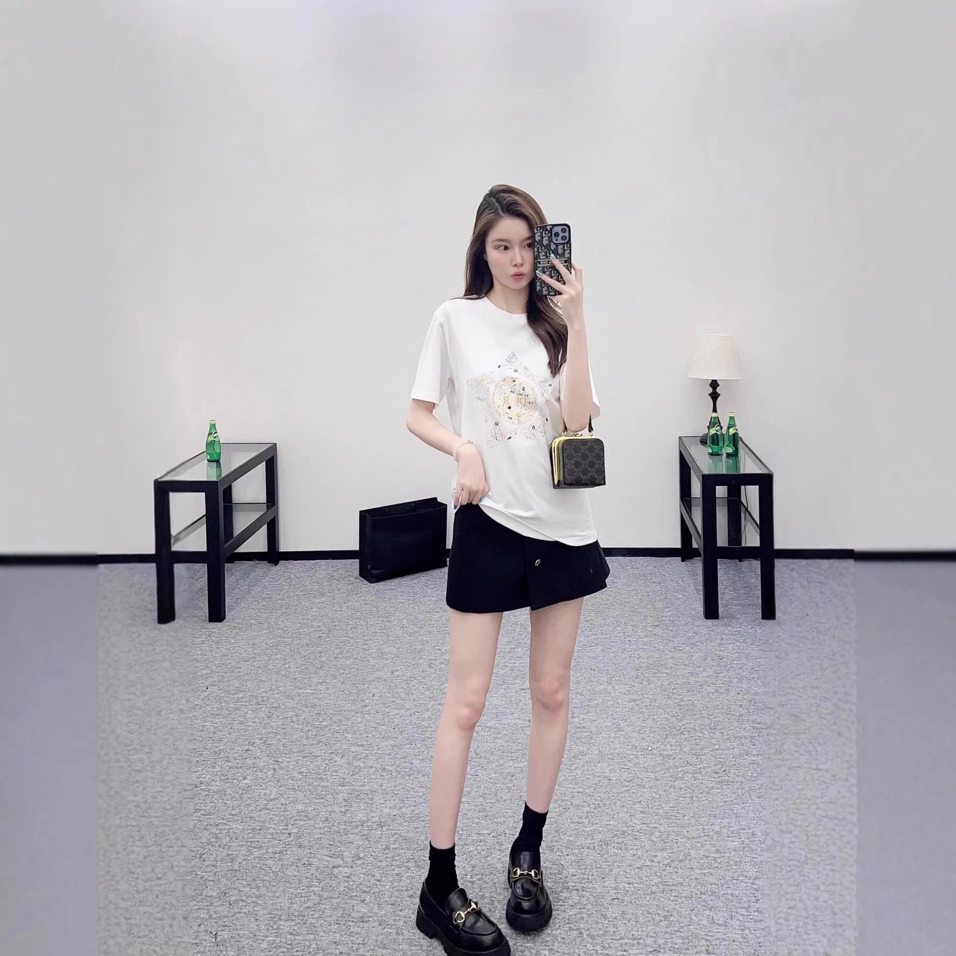 White Graphic Print T-Shirt Black Shorts Casual Outfit