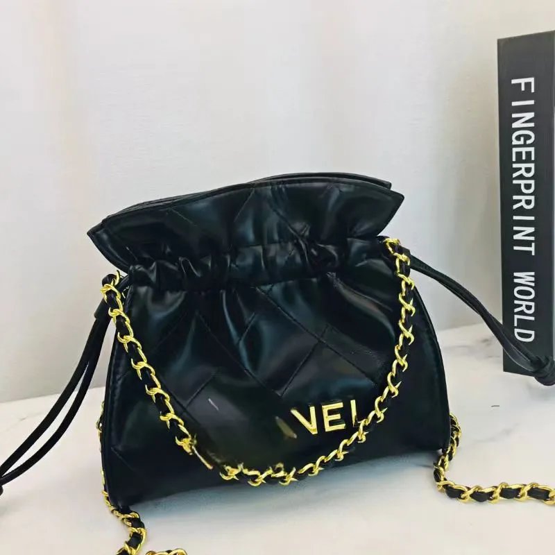 Chanel Drawstring Bucket Bag Black with Gold Chain