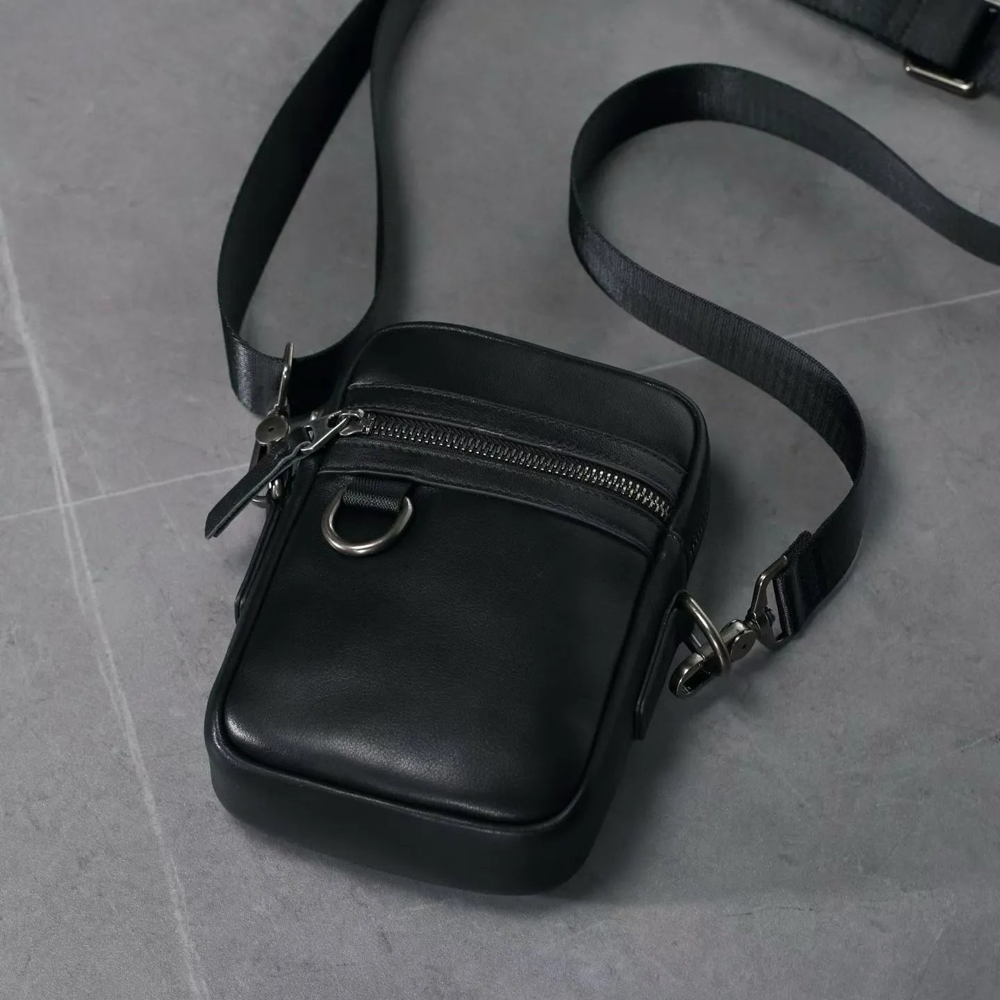 Black Leather Crossbody Bag With Zipper Pocket And Metal Hardware
