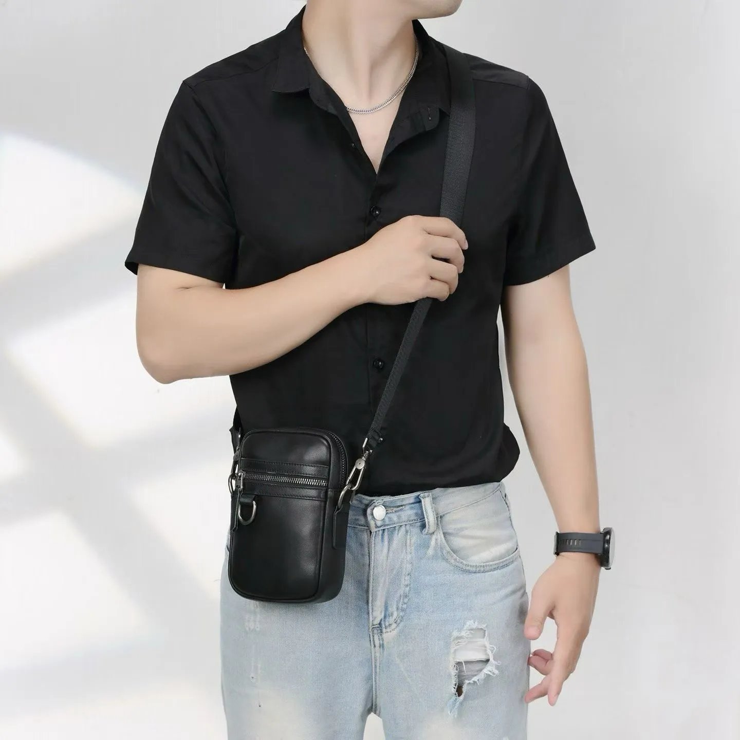Black Leather Crossbody Bag With Zipper Pocket And Metal Hardware