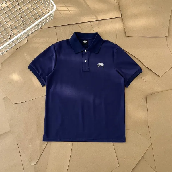 Stussy Classic Logo Polo Shirt in White, Gray, Black, and Navy - 5