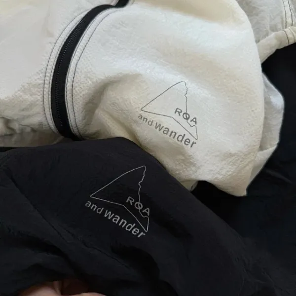Design ROA x And Wander Lightweight Hooded Windbreaker Beige Outerwear - 39