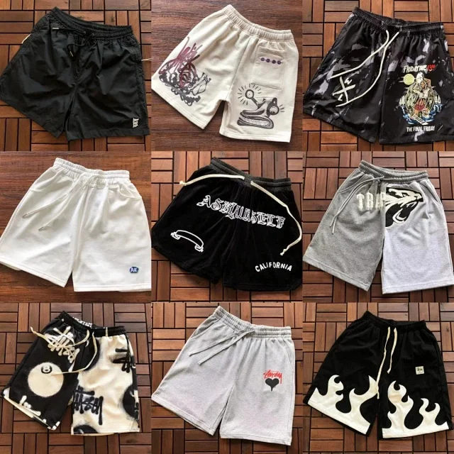 Stüssy Shorts Graphic and camouflage product detail image 1