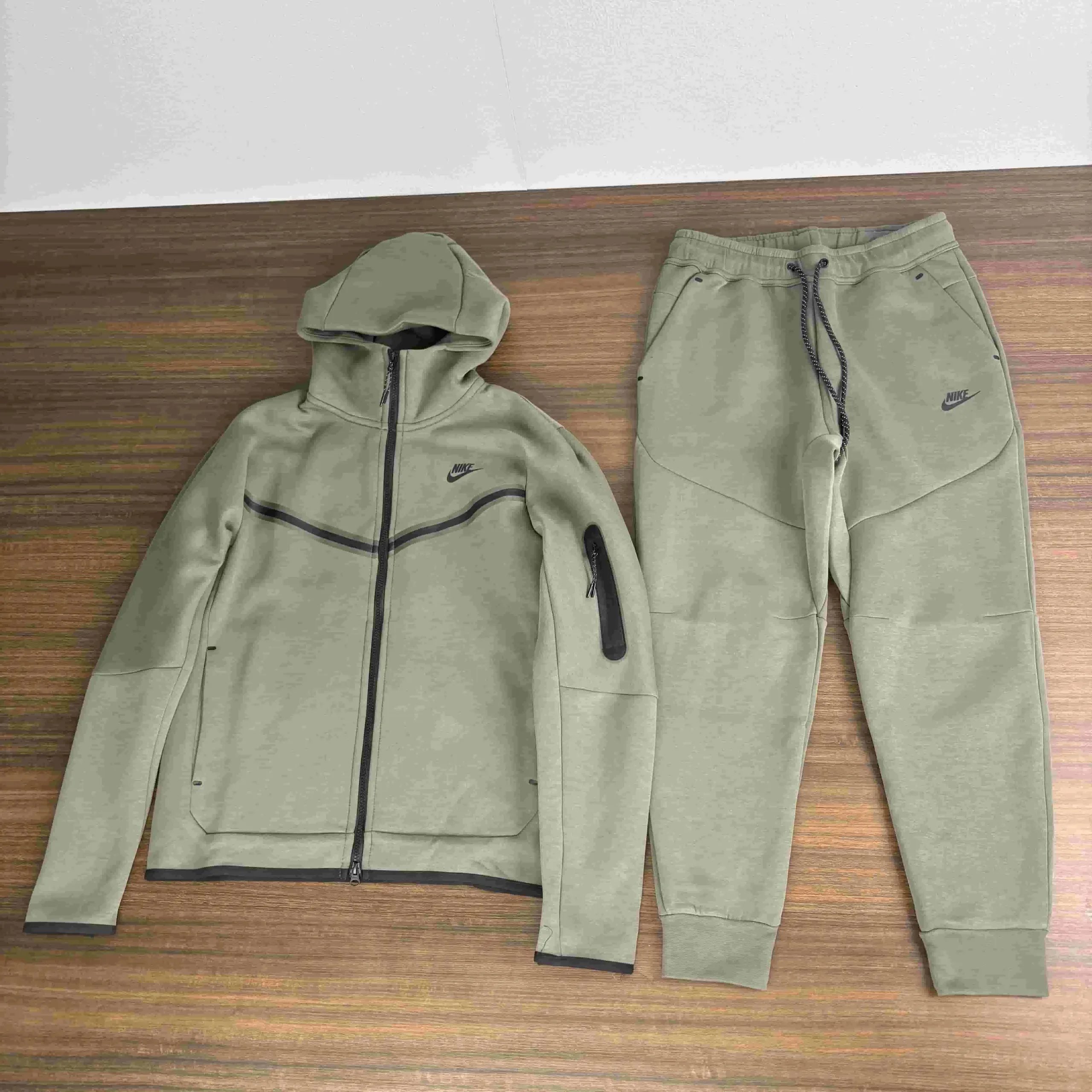 Nike Tracksuits Reflective zip-up hooded tracksuit — 30