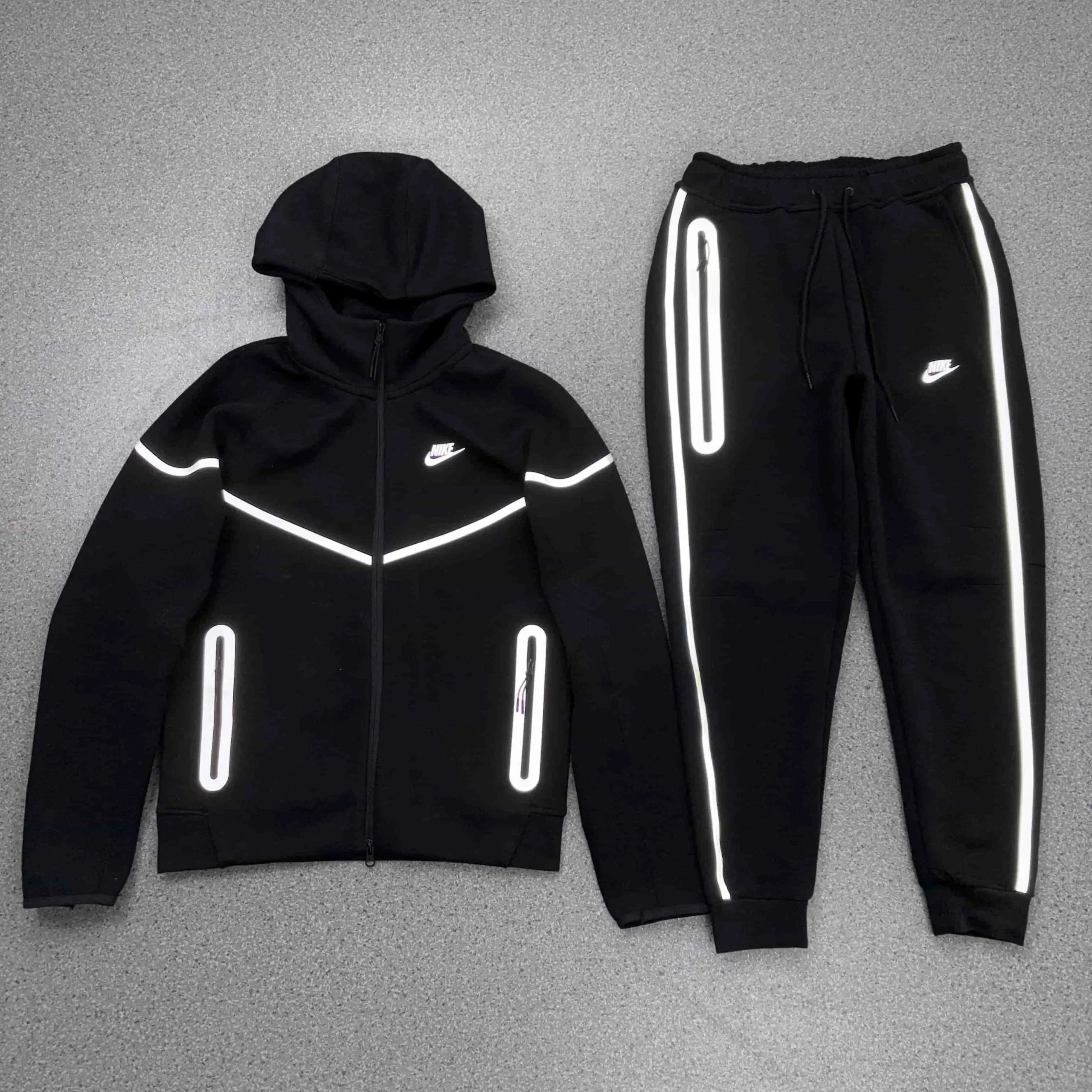 Nike Tracksuits Reflective zip-up hooded tracksuit — 01