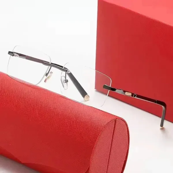 rimless optical glasses with black titanium frame and gold accents - 1