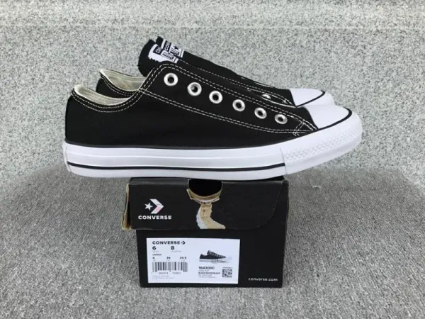 Converse Chuck Taylor All Star Slip-On Black/White Canvas Sneakers - 1