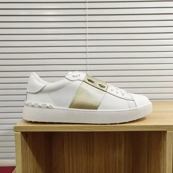 Valentino Garavani Rockstud Spike Low-Top White and Gold Sneakers - 1