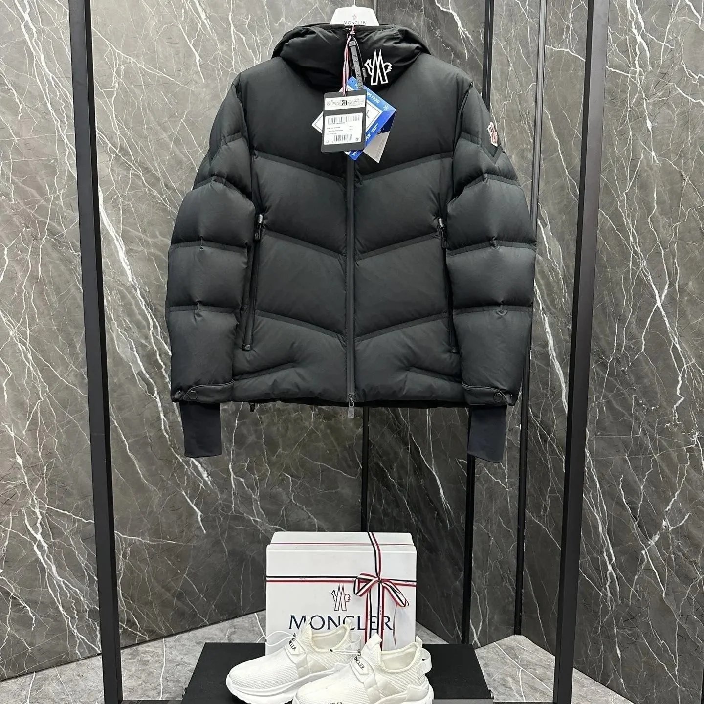 Moncler Down Jackets Hooded quilted puffer jacket — 1