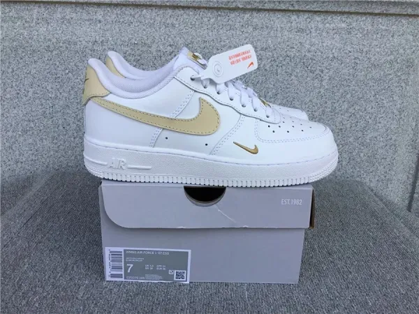 Nike Air Force 1 '07 Low White and Gold Sneakers - 1