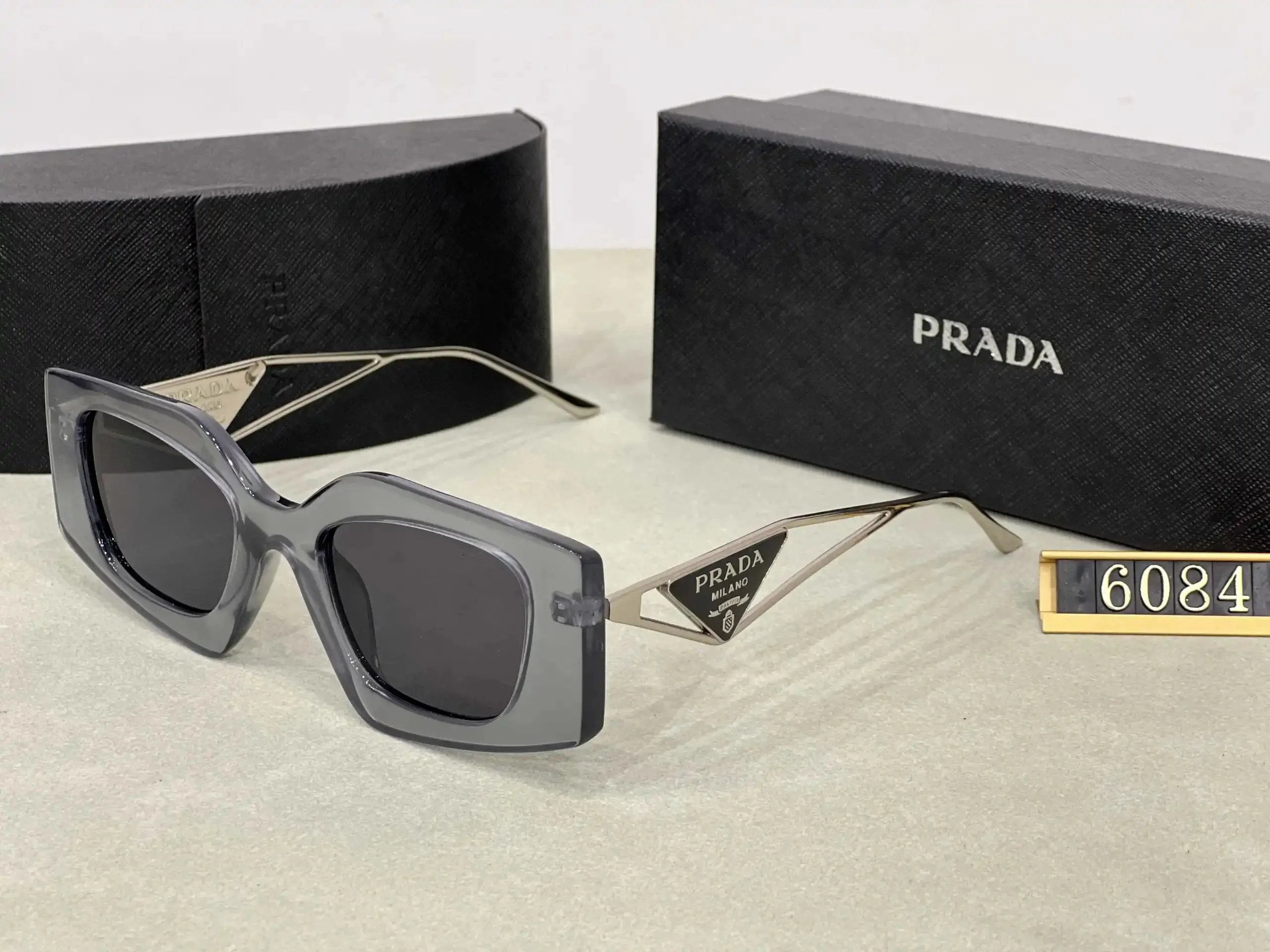 Prada PRADA Milano Triangle Frame Sunglasses Gray Transparent - 1