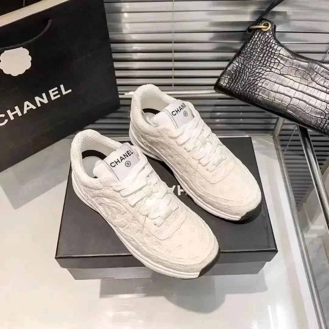Chanel CC Embossed Lace Sneakers White
