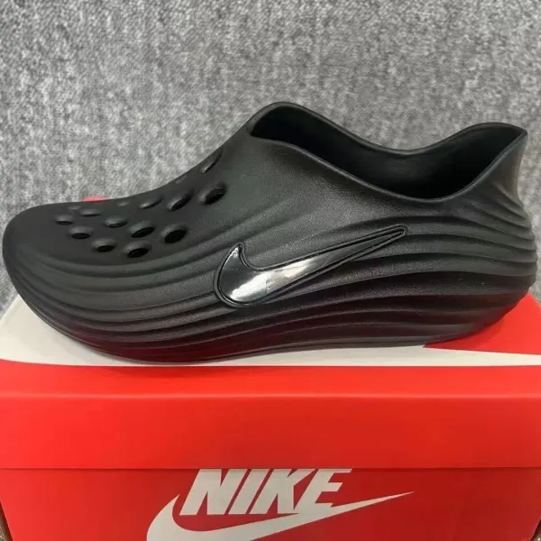 Nike ZOOMX Foamposite Black Clog Sneakers - 1