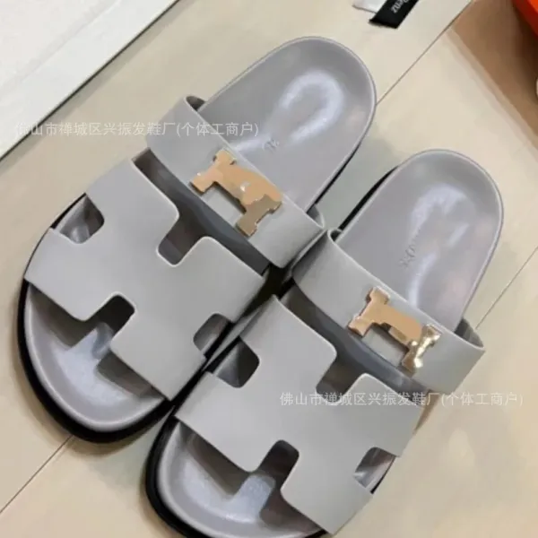 Hermès Oran Slide Gray with Gold H-Logo Slippers - 1