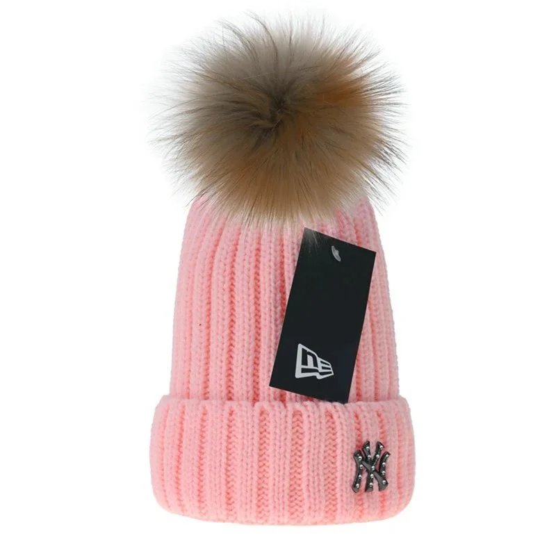 New Era NY Yankees Pink Ribbed Beanie with Raccoon Fur Pom-Pom - 1