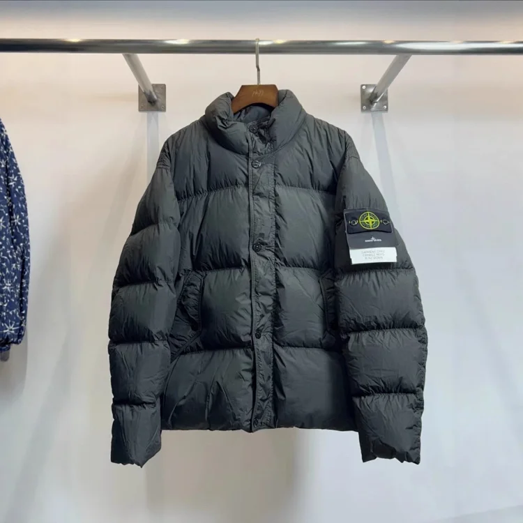 Catalog seller-listing image: Stand-collar padded jacket with side badge; not warehouse QC