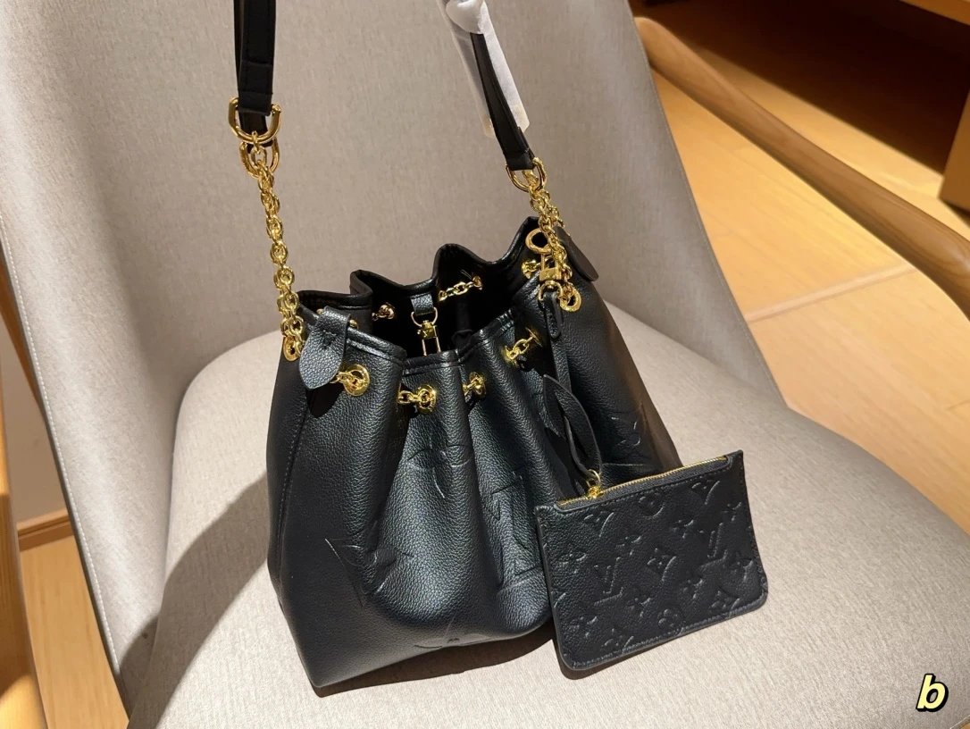 Louis Vuitton Handbags Mini top-handle handbag with detachable shoulder strap — 23