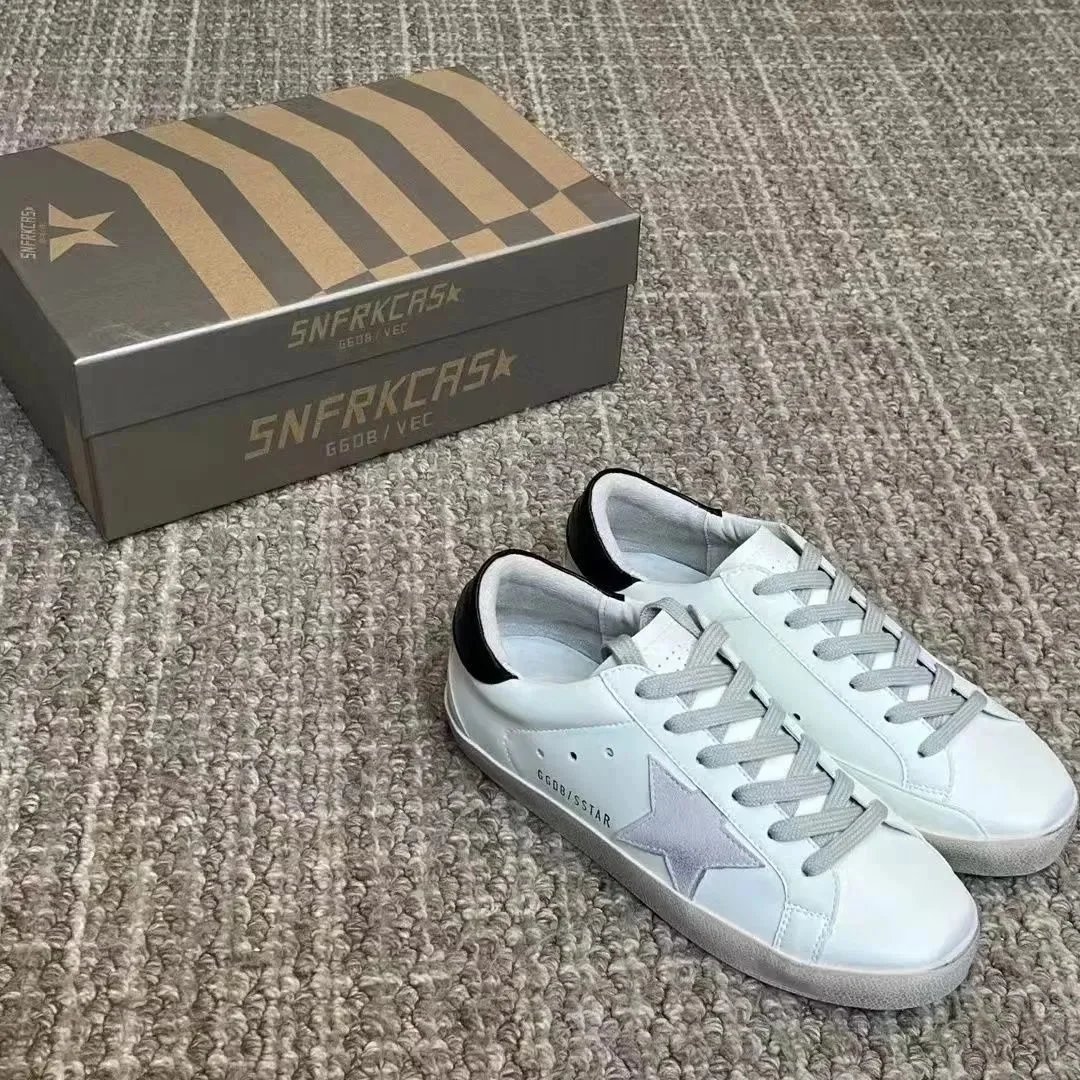 Golden Goose Golden Goose Star Sneakers in White with Silver Accents White
