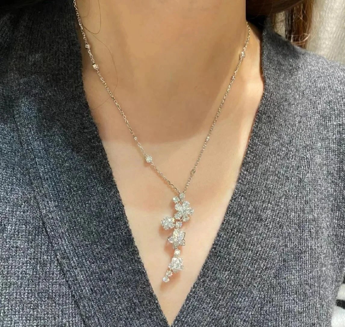 Silver Floral Pendant Necklace Blue And White Cubic Zirconia Elegance