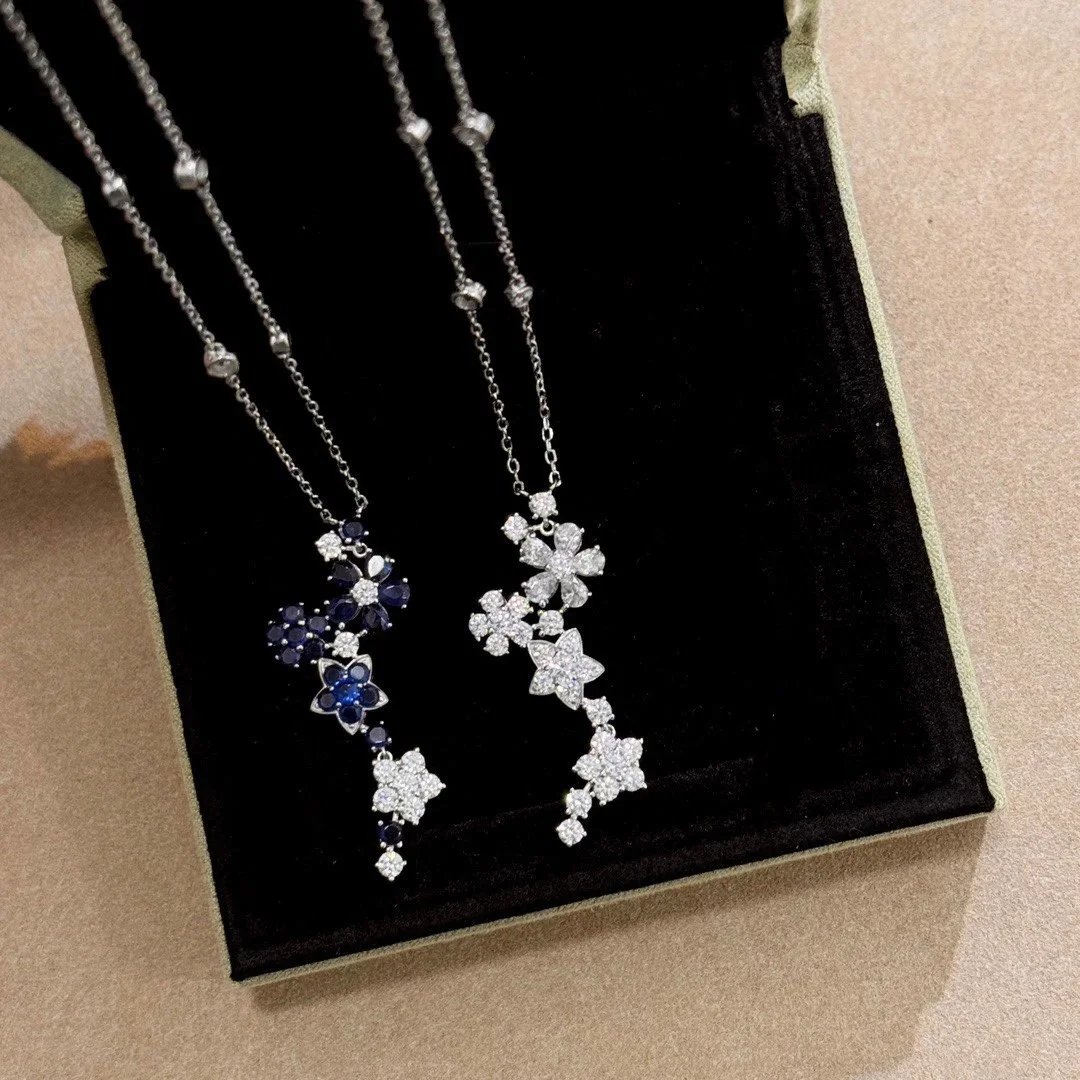 Silver Floral Pendant Necklace Blue And White Cubic Zirconia Elegance