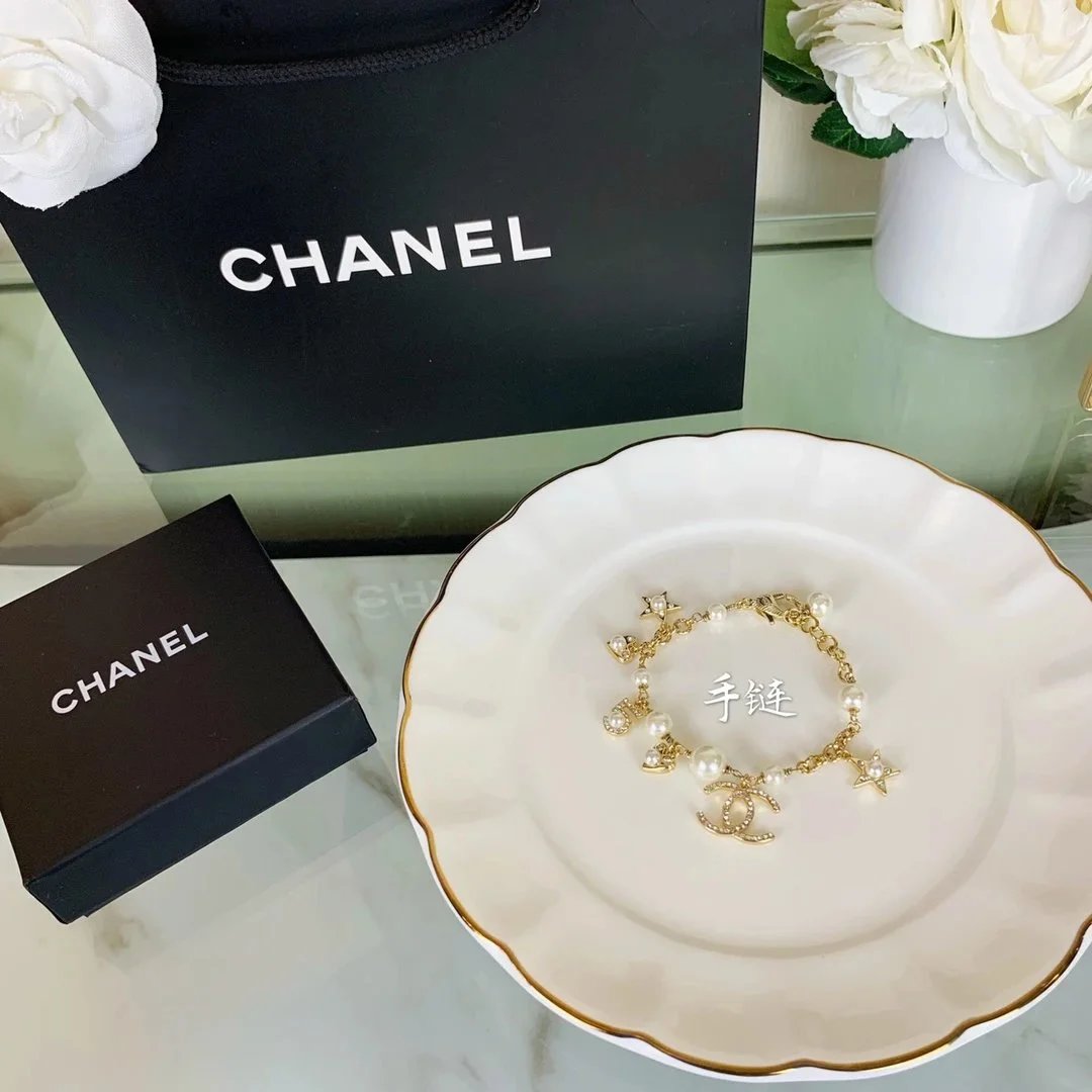 Chanel CC Logo Pearl Gold-Tone Charm Bracelet