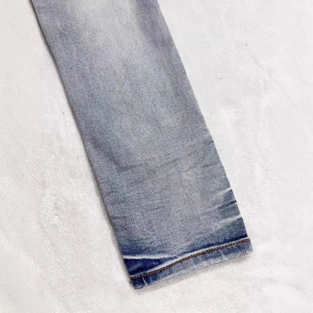 AMIRI AM1225 Light Blue Distressed Patchwork Jeans