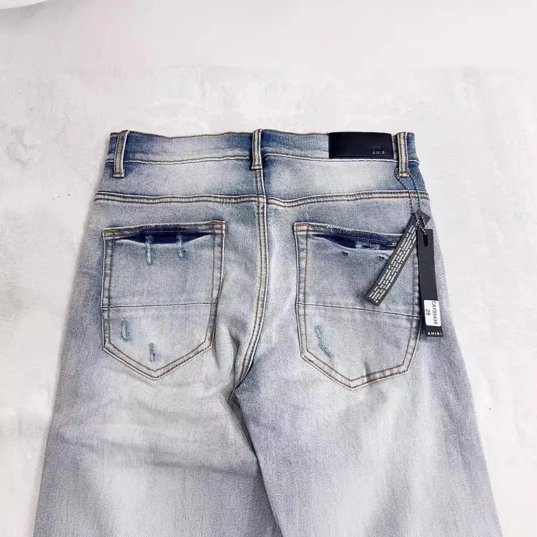 AMIRI AM1225 Light Blue Distressed Patchwork Jeans