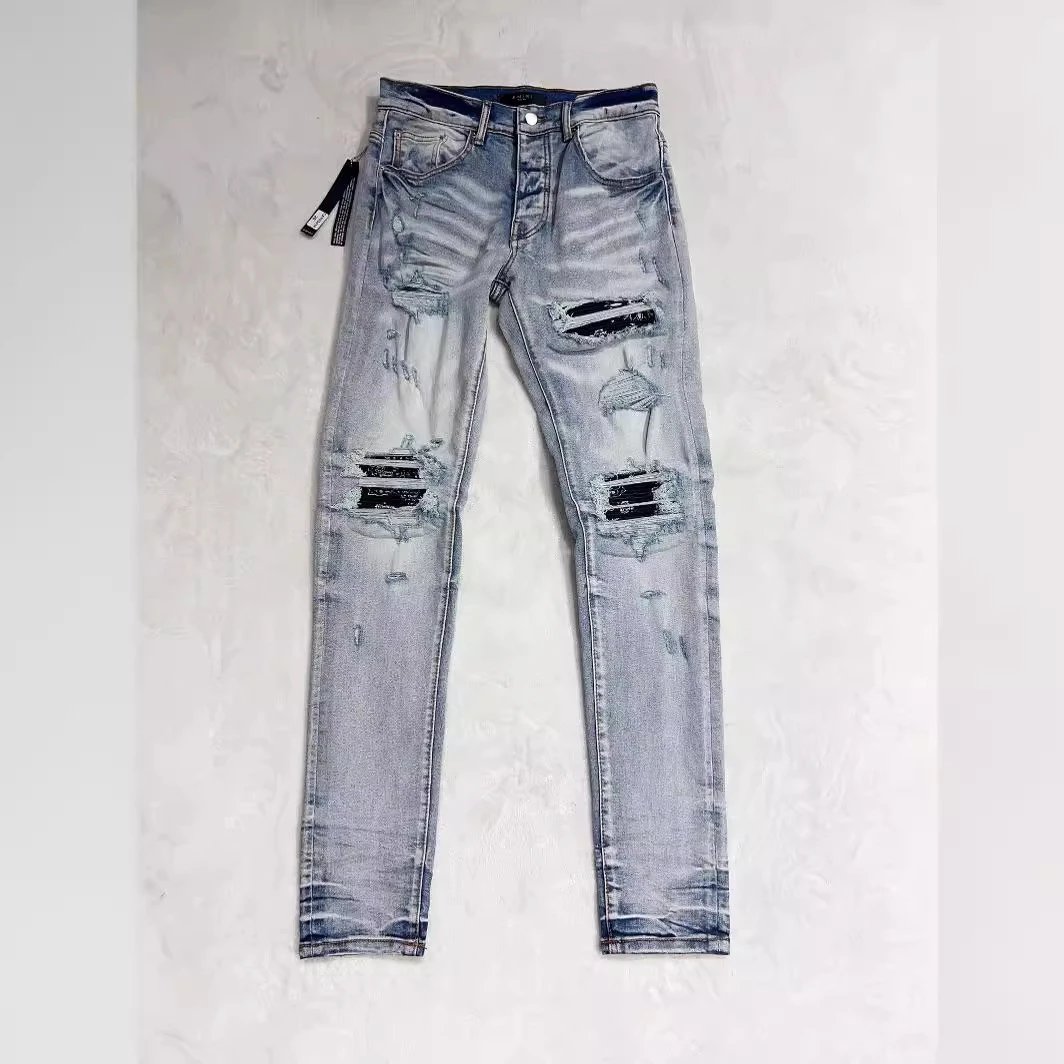 AMIRI AM1225 Light Blue Distressed Patchwork Jeans