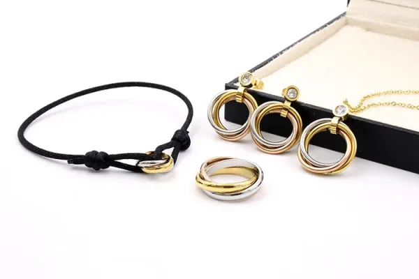 Cartier Trinity Bracelet with Gold Cord Jewelry - 19