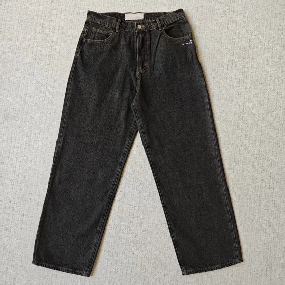 Two characters wearing denim pants