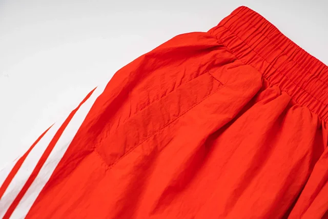 Mixed Emotion Trousers Striped Nylon Track Pants with Cupid Graphic product detail image 3