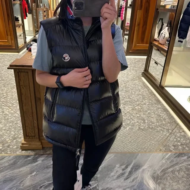 Moncler Vests Glossy quilted stand-collar down vest with contrast-trimmed collar product detail image 5