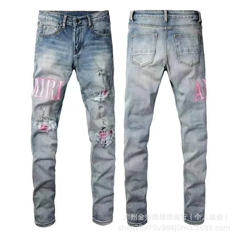 AMIRI Jeans Distressed embroidered patch — No. 33