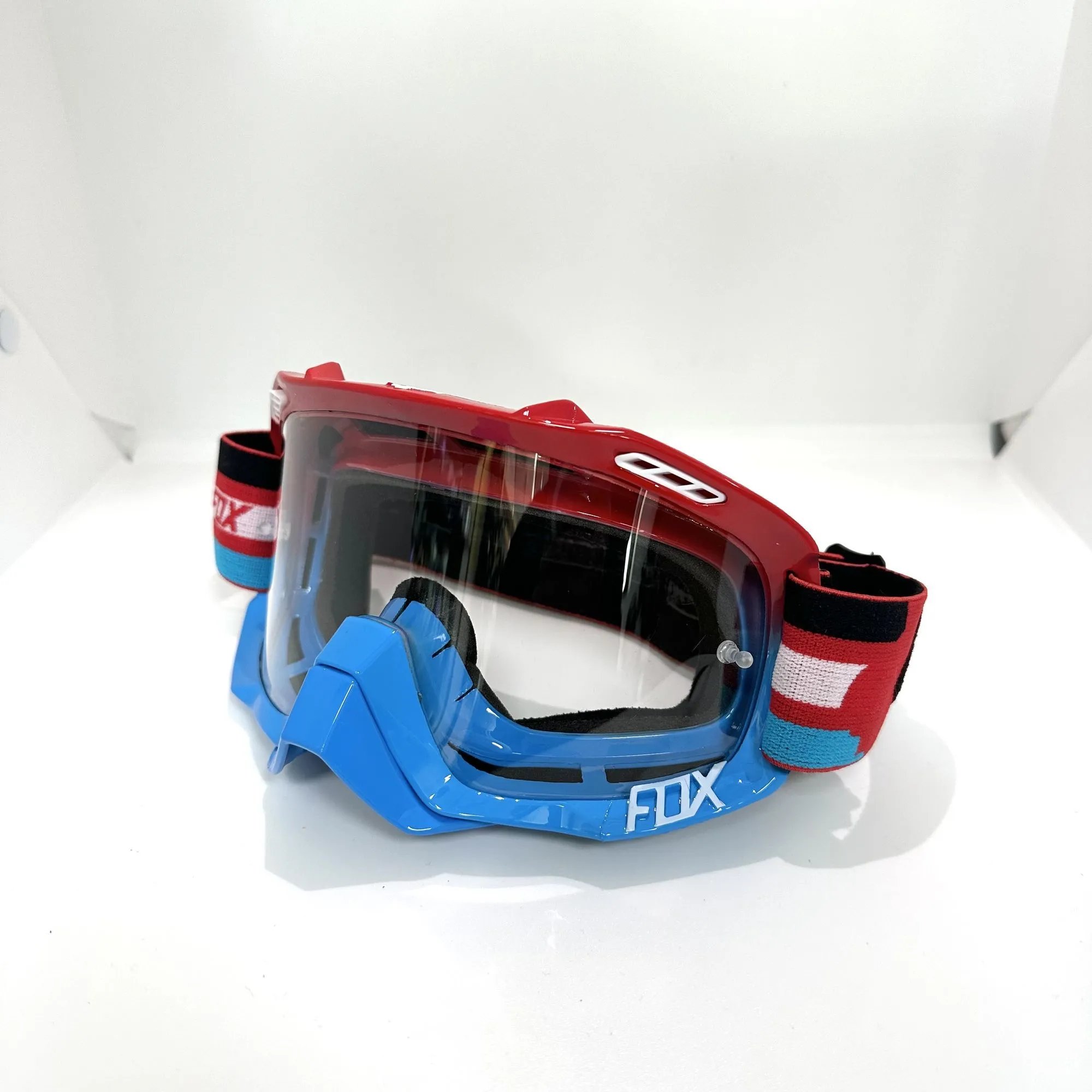 FOX Red and Blue Clear (free glasses bag with anti-fog wipes)