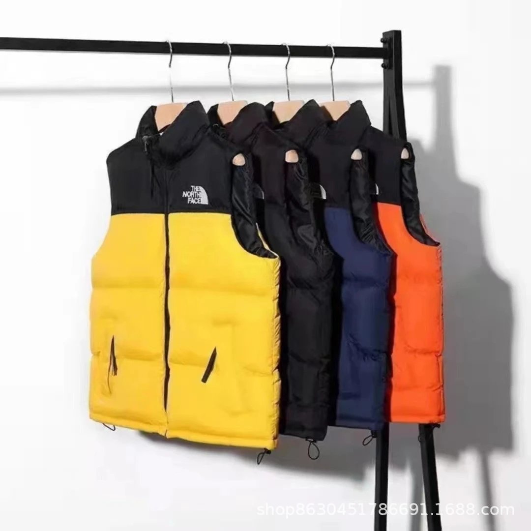 The North Face Black and Yellow Puffer Vest