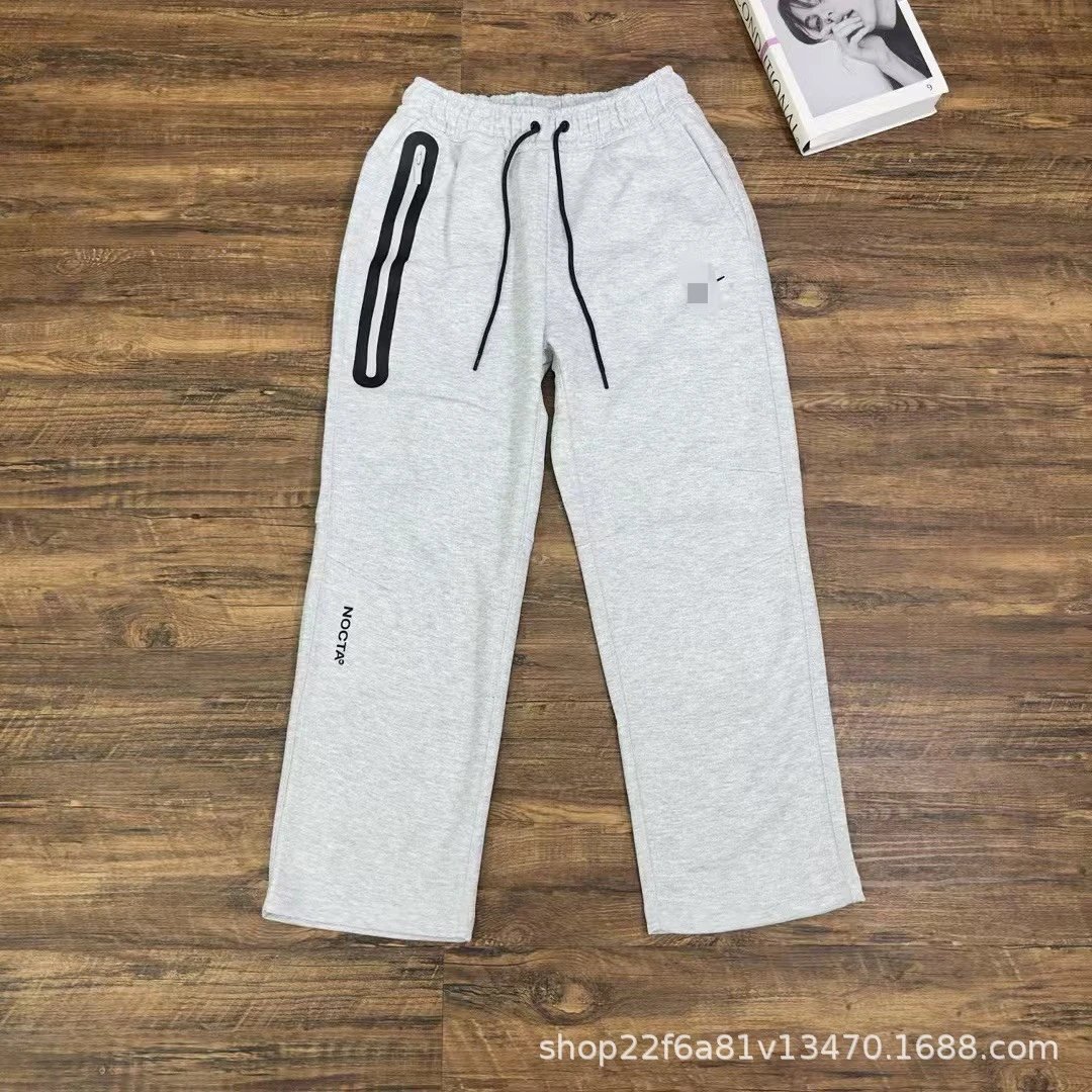 NOCTA NOCTA Grey Melange Sweatpants with Black Drawstrings and Side Pockets Grey