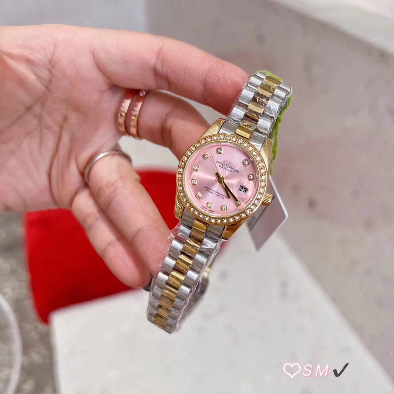 Rolex Watches Datejust crystal-bezel two-tone bracelet watch — Golden powder on a ring of diamonds