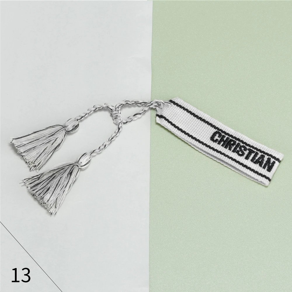 Christian Louboutin Christian Louboutin Embroidered Tassel Bookmark in White and Black White