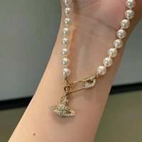 Saturn pin pearl necklace [gold color]