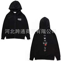 Black hooded pullover with a heart-shaped panel