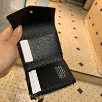 Triangular tri-fold