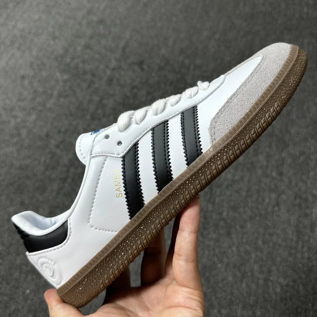 AD Samba black, white, and gray with logo FW2427