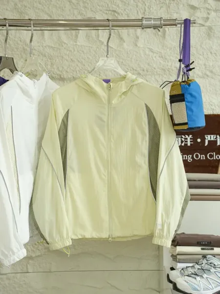 Unidentified Lightweight Hooded Windbreaker in Pale Yellow with Mesh Panels - 1
