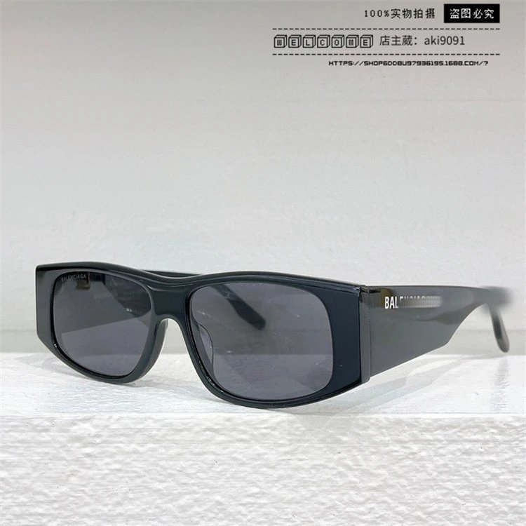 Black frame with gray piece and white logo