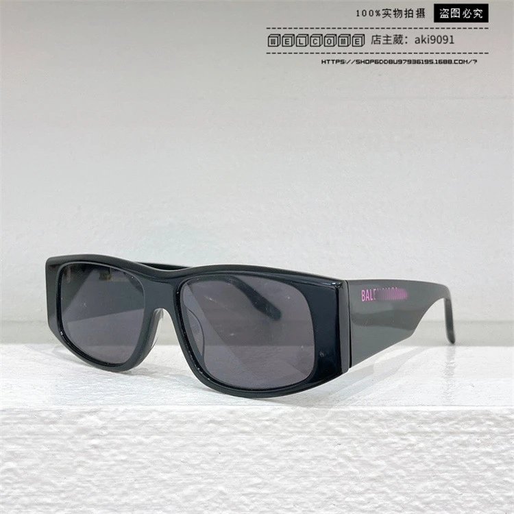 black frame with gray piece and pink logo