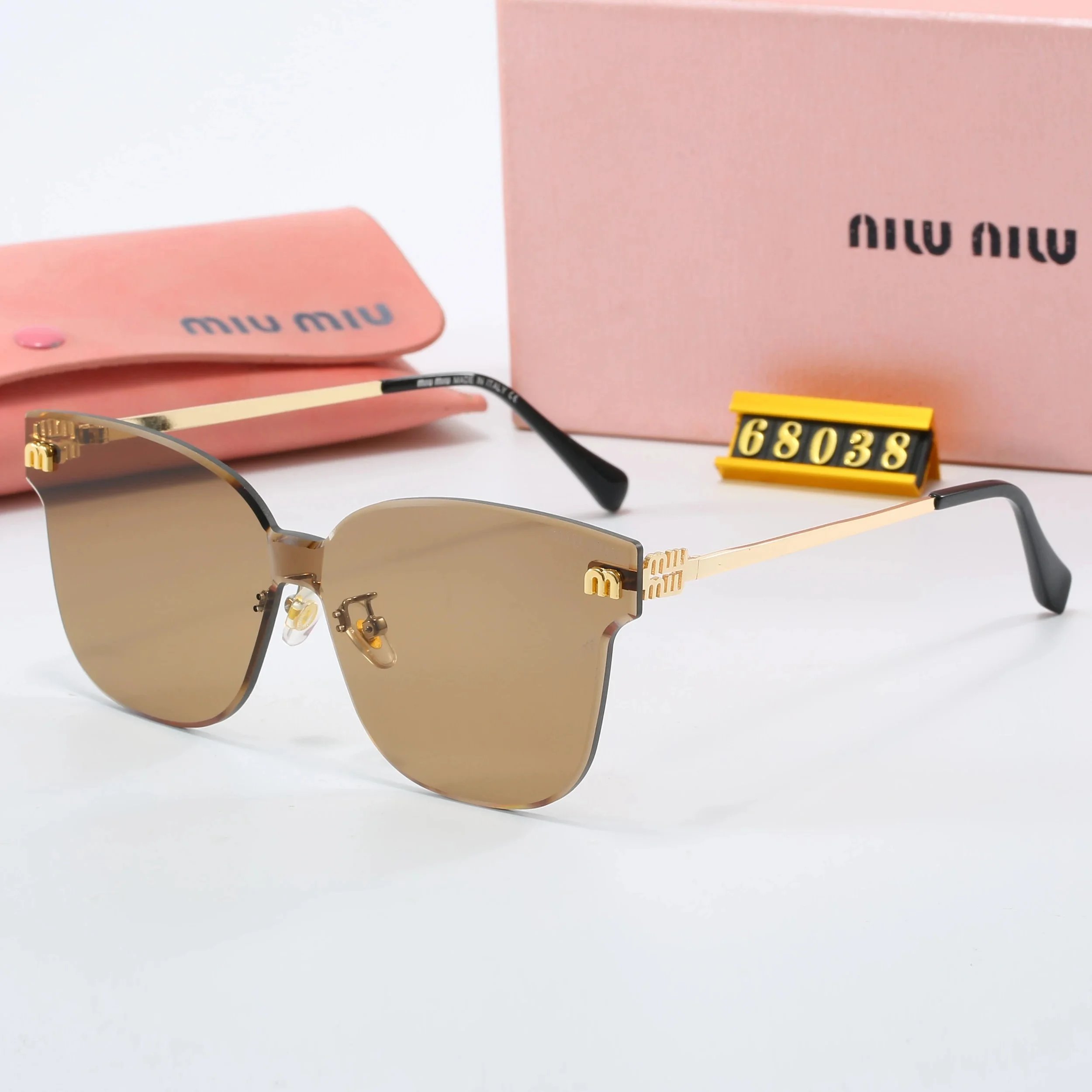 Miu Eyewear Rimless geometric sunglasses with logo temples — 11