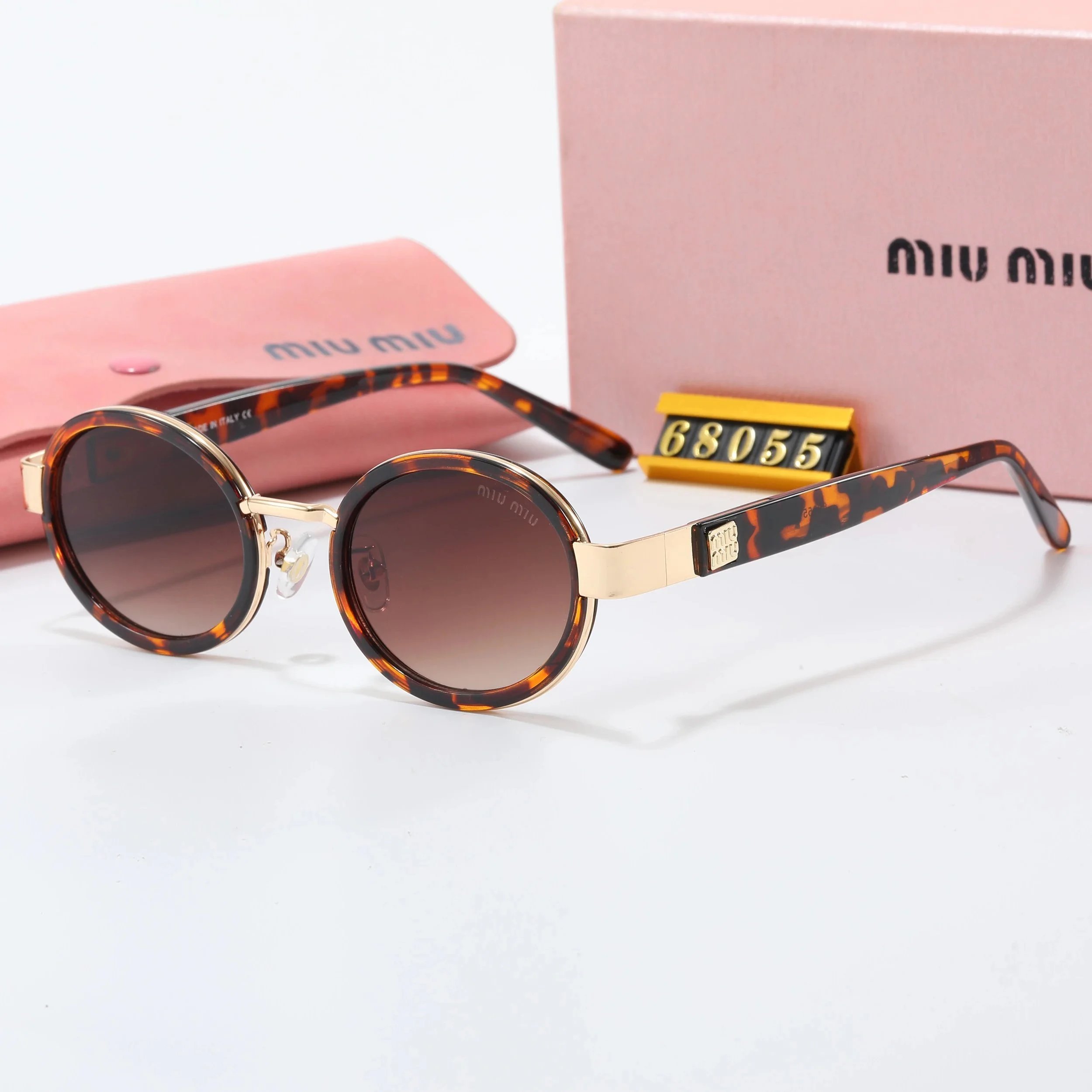 Miu Eyewear Oversized rimless shield sunglasses with gold logo temples — 22
