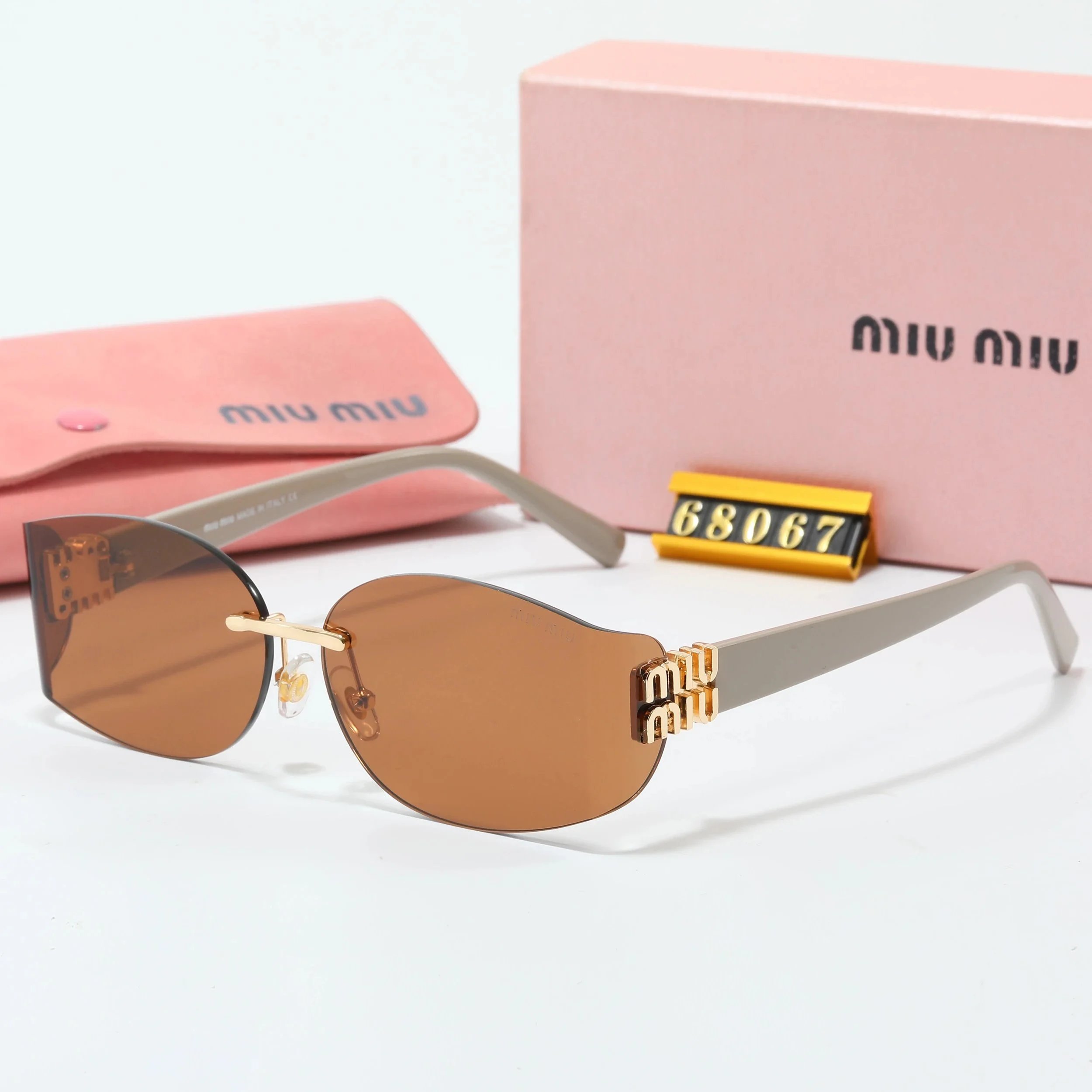 Miu Eyewear Oversized rimless shield sunglasses with gold logo temples image 11
