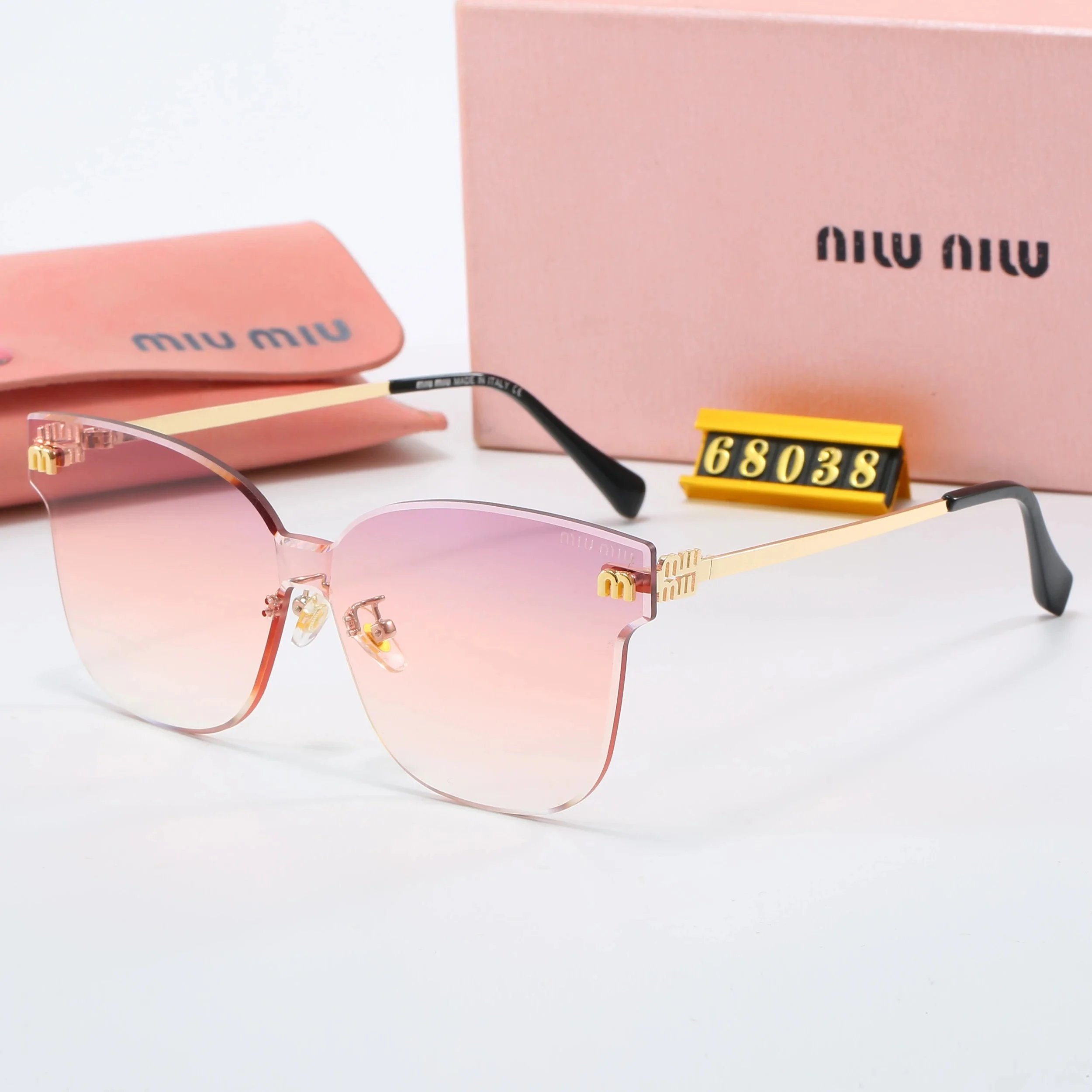 Miu Eyewear Rimless geometric sunglasses with logo temples — 13